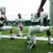 EMU players stretch before the spring practice on Sunday, April 14. AnnArbor.com I Daniel Brenner